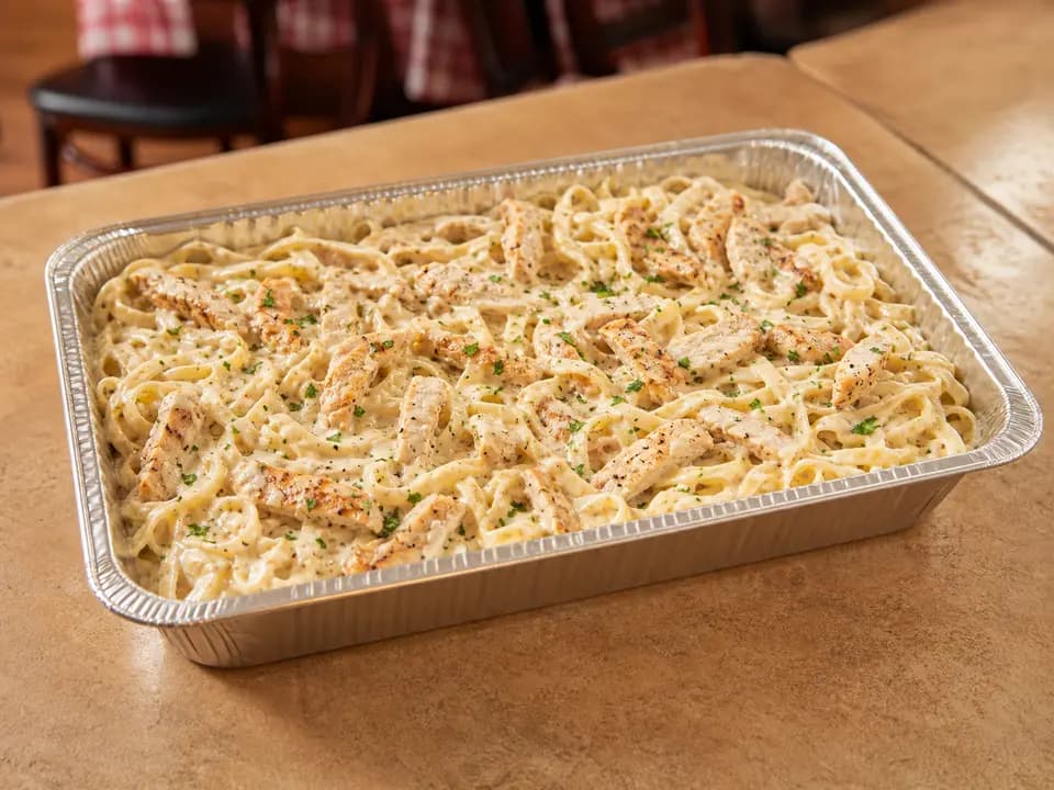 Original editorial rendering of Chicken Alfredo (Serves 4–6) for the catering menu reference