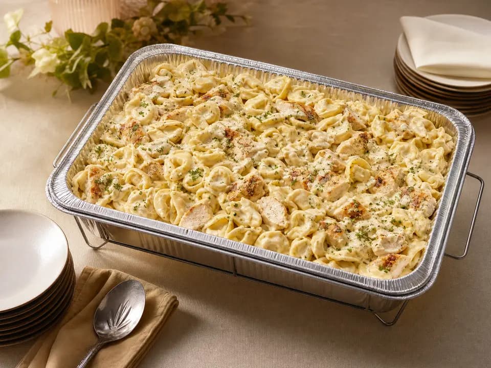Original editorial rendering of Chicken Tortelloni Alfredo (Serves 4–6) for the catering menu reference