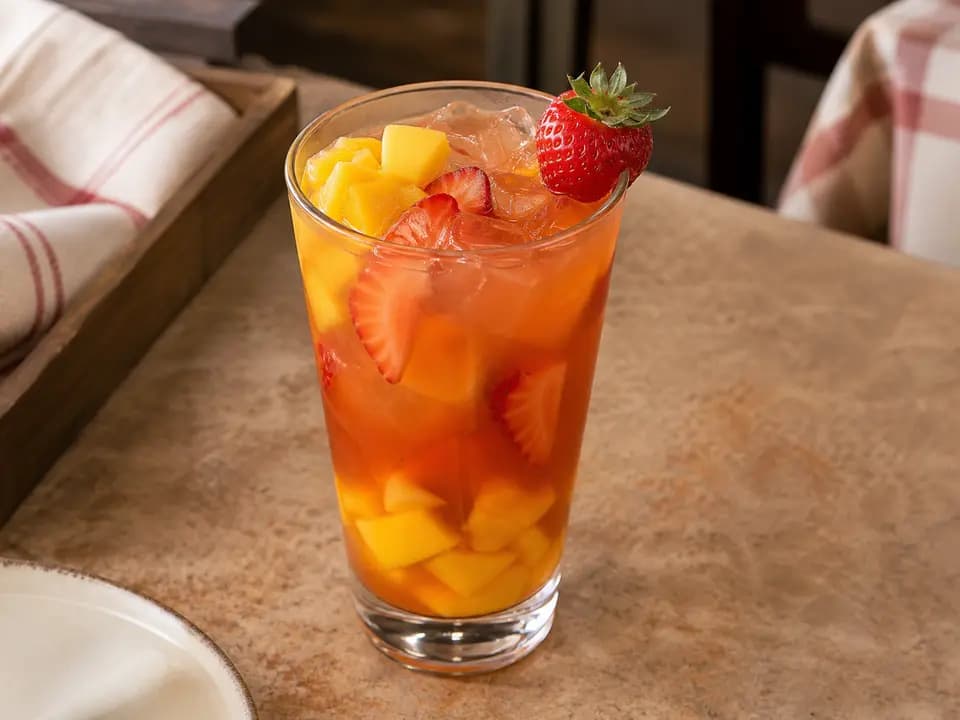 Original editorial rendering of Mango-Strawberry Iced Tea for the drinks menu reference