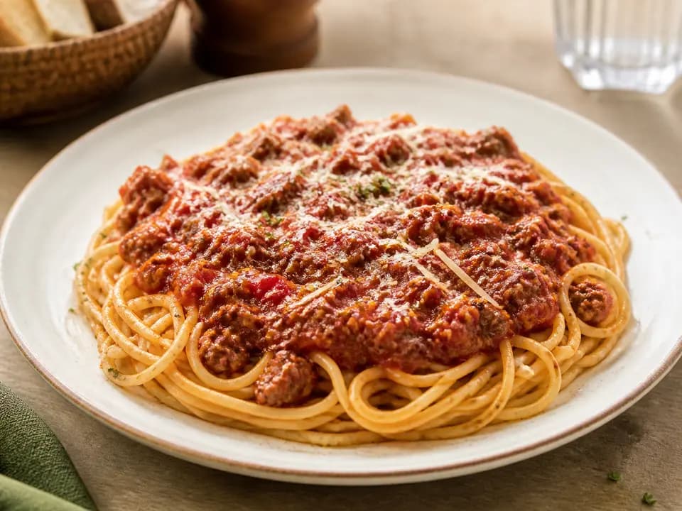 Original editorial rendering of Spaghetti with Meat Sauce for the entrees menu reference